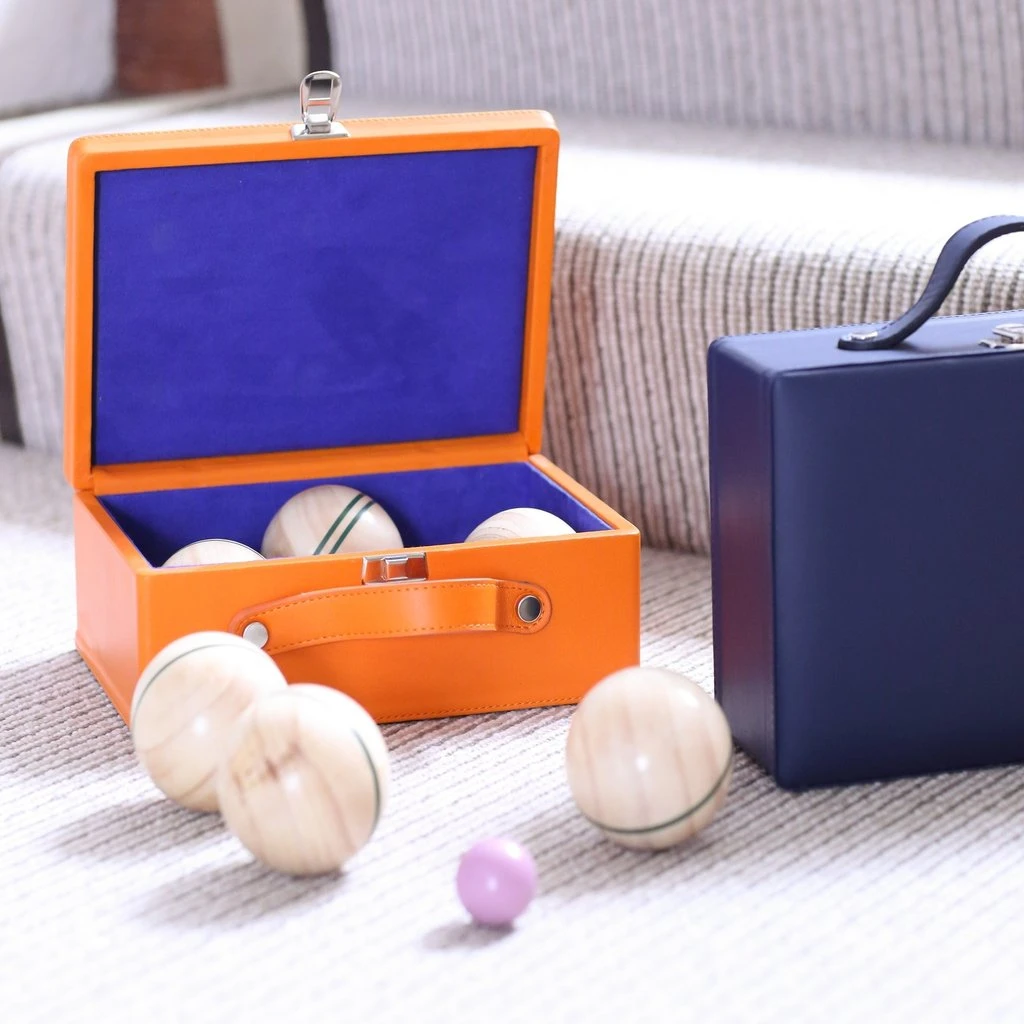 Junior Magazine If you’re staying home this Father’s Day, how about a game of Boules with this indoor carpet friendly set? Scores extra points for the gorgeous suede lined leather bound case.