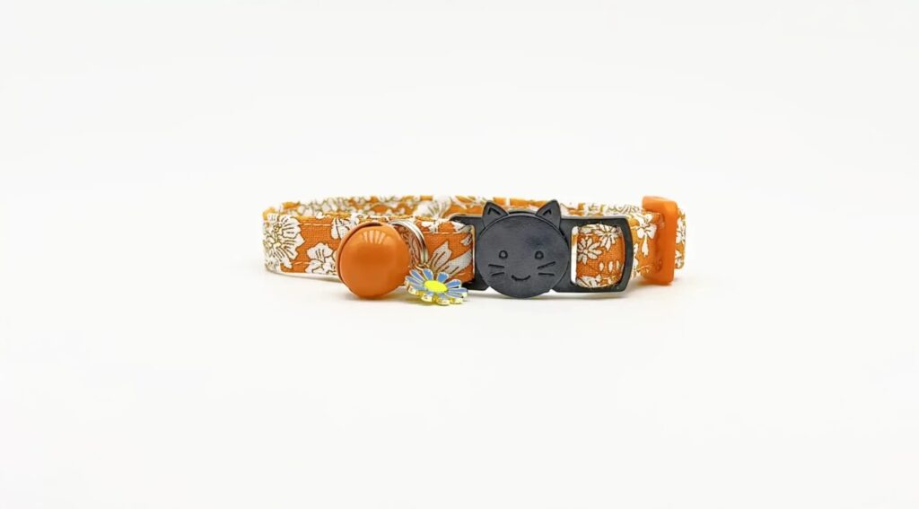 Junior Magazine Liberty Emily Belle Tangerine Fabric Cat Collar, £11.99, Bells & Whiskers