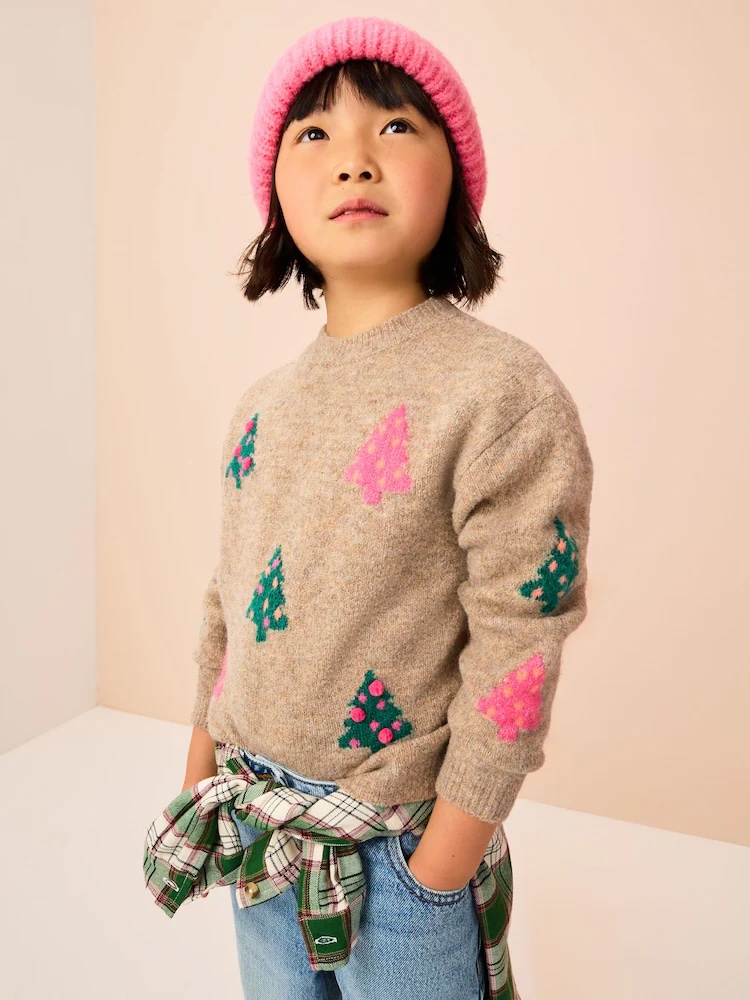 Junior Magazine Oatmeal Christmas Tree Jumper, from £18 – £23 NEXT