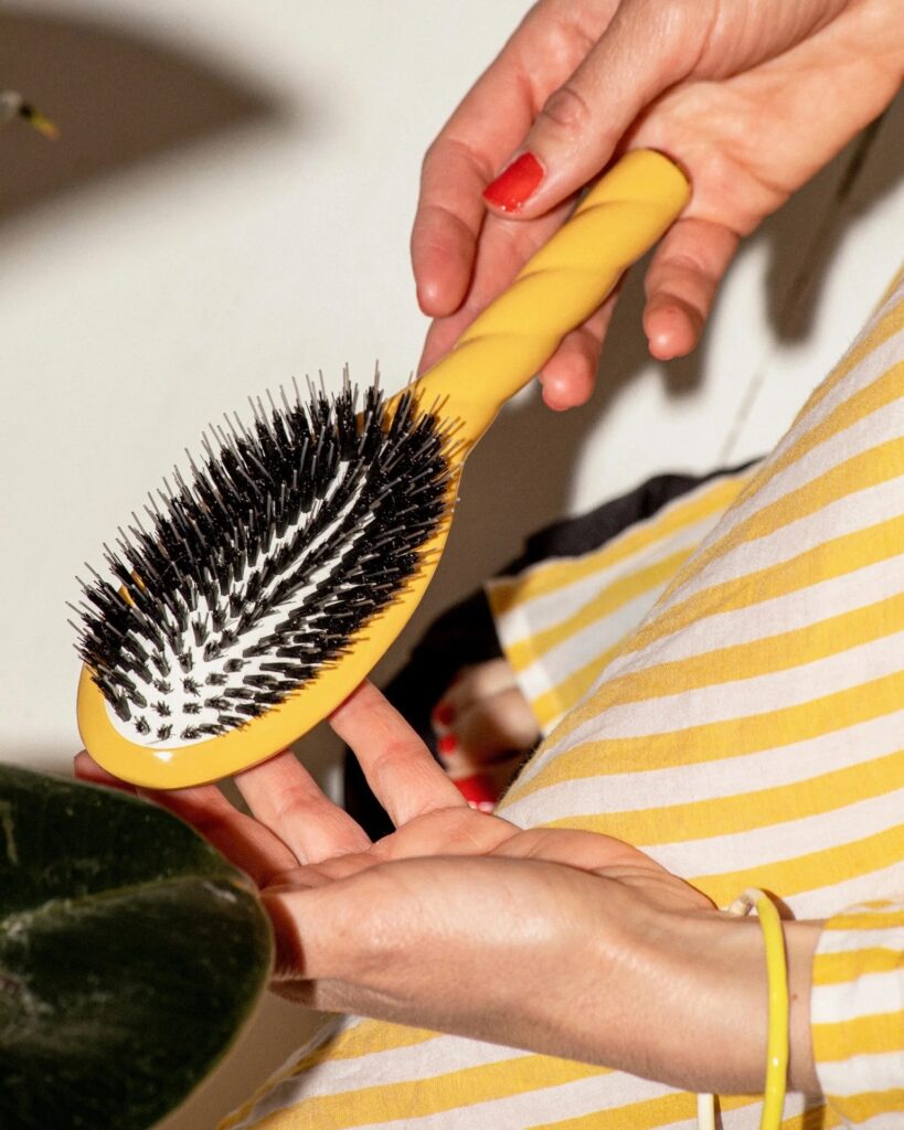 Junior Magazine Detangling HairBrush The Essential in Saffron Yellow, £146, La Bonne Brosse