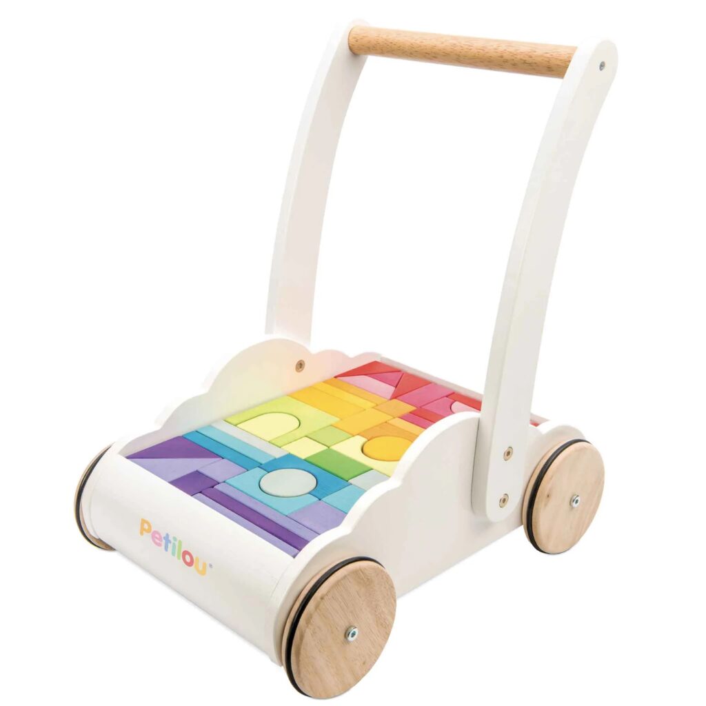 Junior Magazine A classic first walker with beautiful water-based rainbow colour puzzle blocks. We think this makes the perfect first birthday gift.