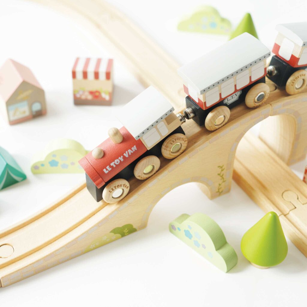 Junior Magazine The perfect introduction to wooden trains, this 40-piece set contains everything little ones will need to set up a realistic play area. The wooden carriages are magnetic and easily attached together to make a longer train.