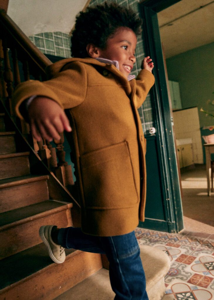 Junior Magazine A warm, soft coat in a classic colour that can be passed down time and time again. Great pockets for gloves and school letters. Star of the week again?