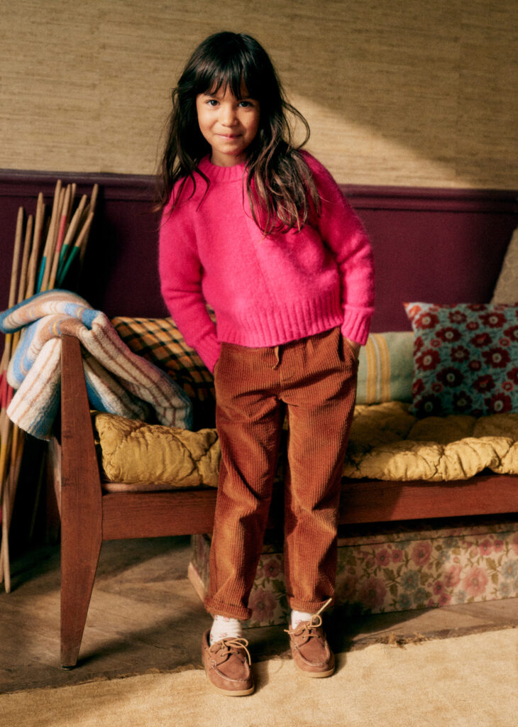 Junior Magazine Fuchsia knitwear for a neon pop of colour in the winter weather. Made from super warm, baby alpaca wool.