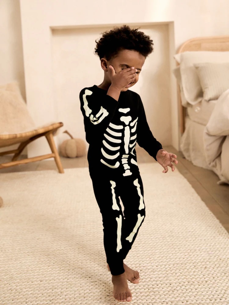 Junior Magazine Black Glow in the Dark Skeleton Pyjamas, from £12, NEXT