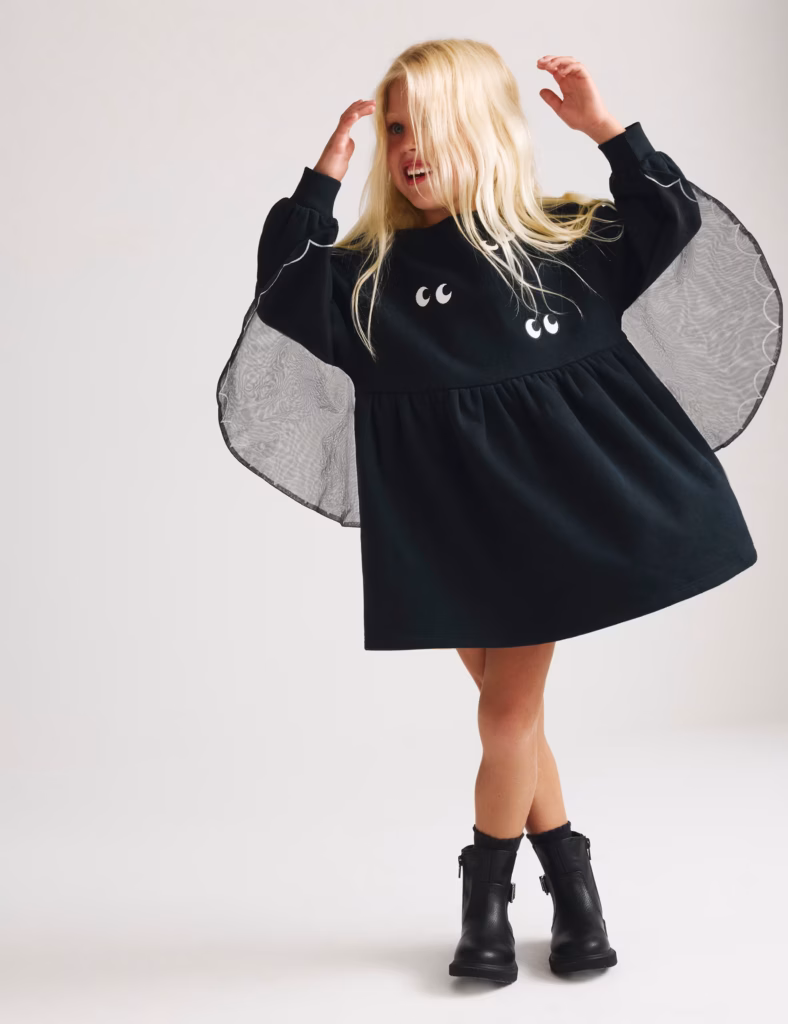 Junior Magazine Cape Dress, £9, M&S