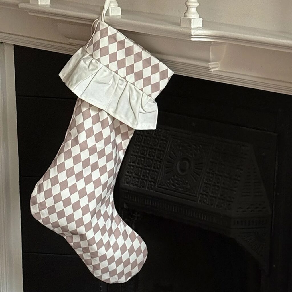 Junior Magazine Harlequin Ruffled Stocking in Chestnut Spice, £32, Evie & Skye