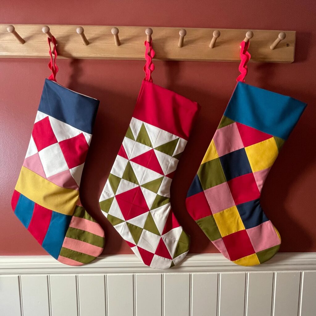 Junior Magazine ‘Pagliacci’ Handmade Patchwork Cotton Christmas Stocking, £50, Kate Owen