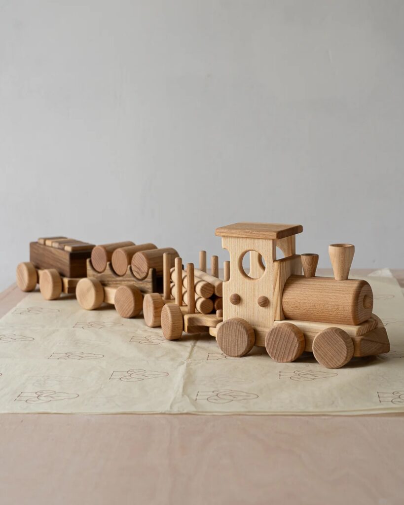 Junior Magazine Pull Along Train and Wooden Building Blocks, £74.95, Toys From the Woods