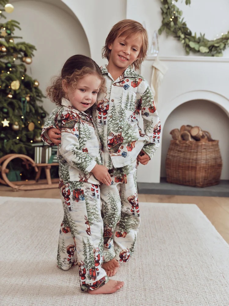 Junior Magazine Santa Matching Family Christmas Kids Pyjamas, from £16, NEXT