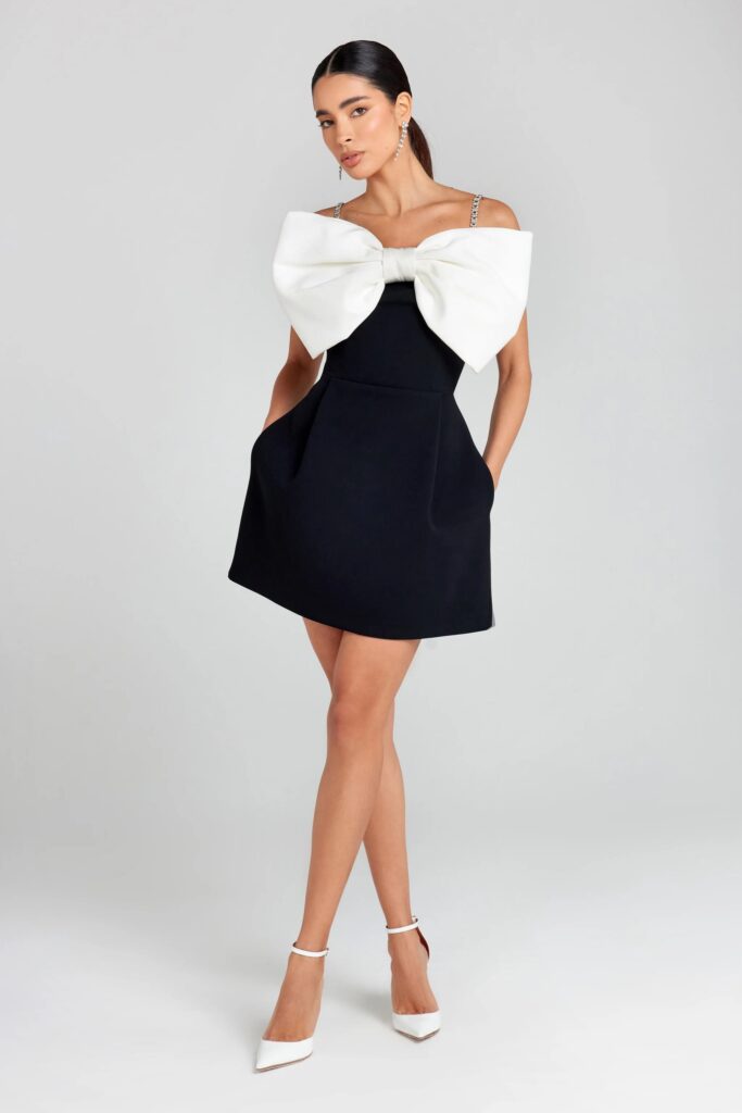 Junior Magazine Jenny Bow Dress, £329, Nadine Merabi