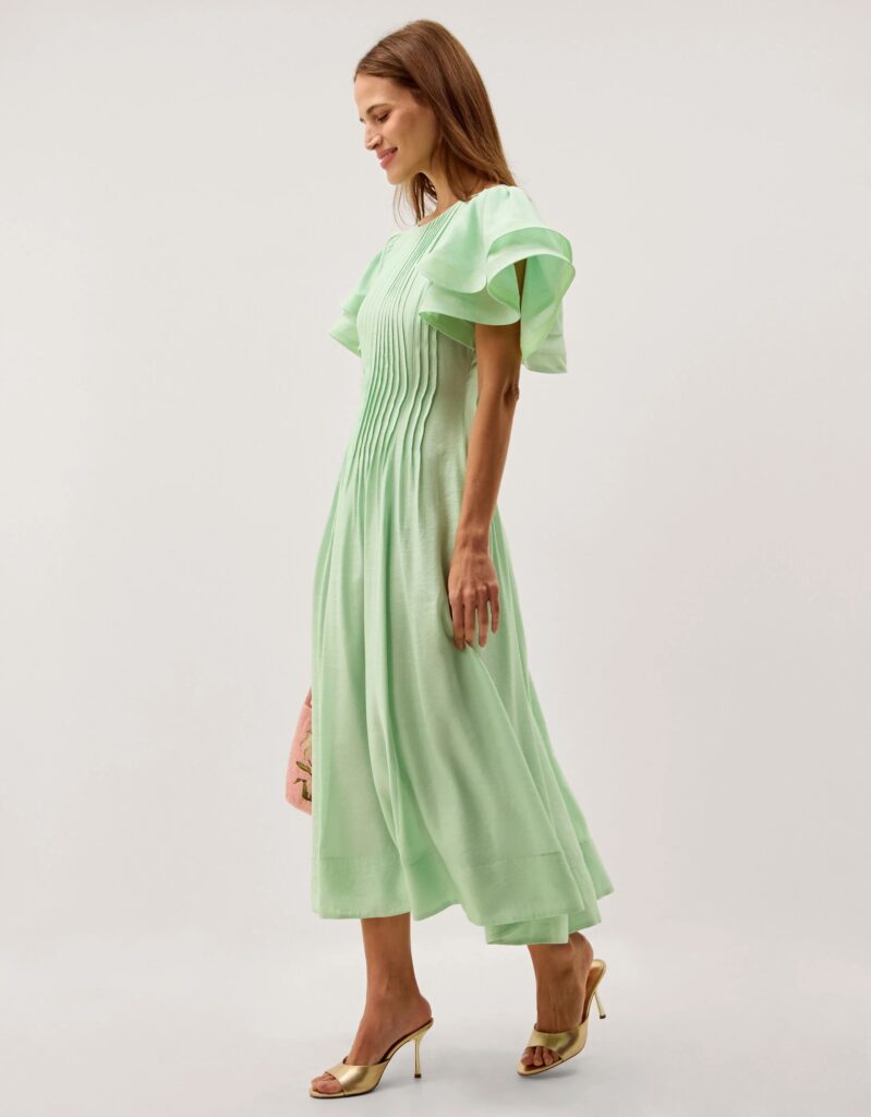 Junior Magazine Pelia flutter sleeve pleated midi dress, £160, Monsoon