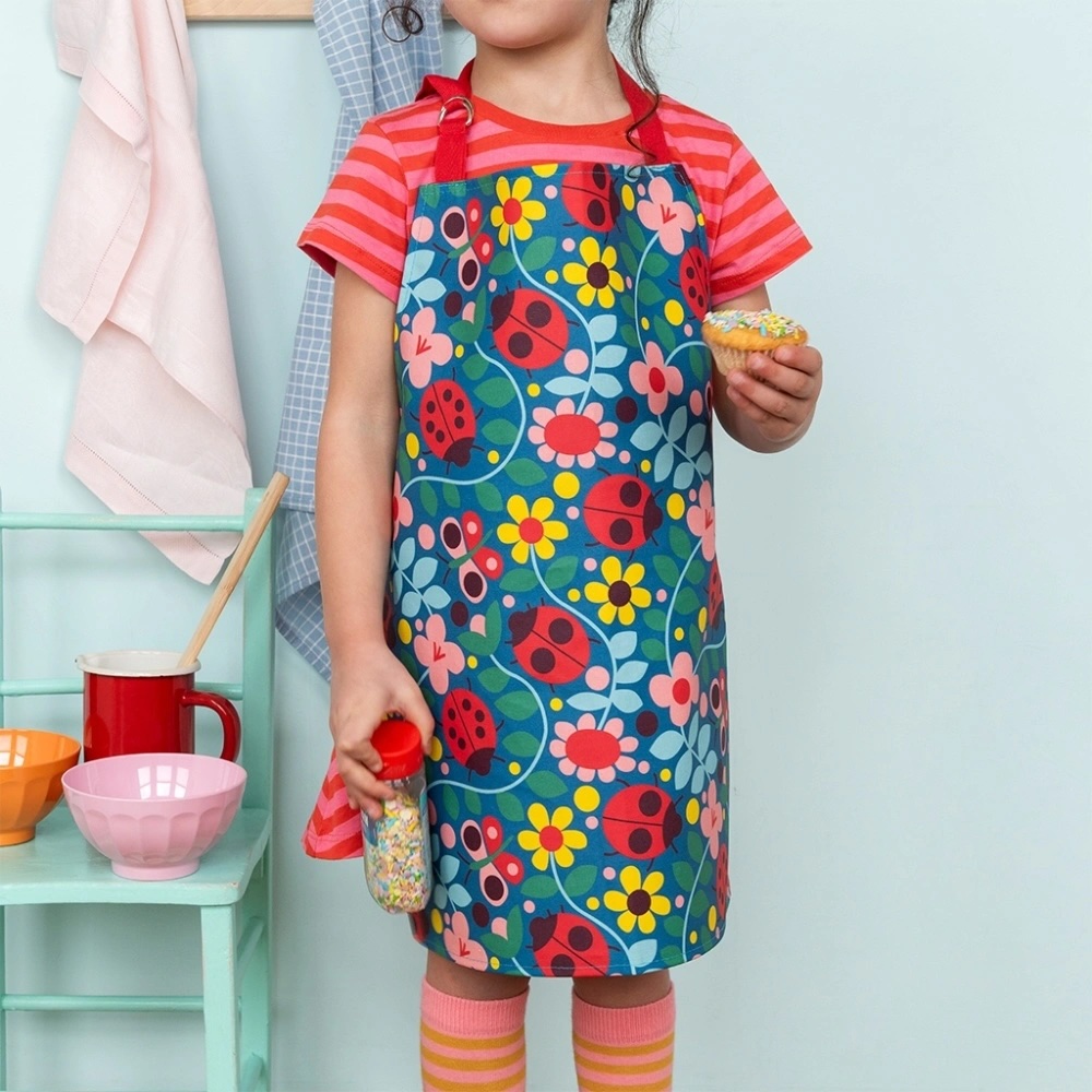 Junior Magazine Wipeable Ladybug Apron, £14.95, REX London