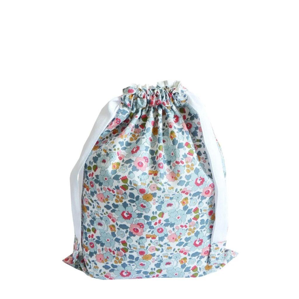 Junior Magazine Coco & Wolf Liberty Print Drawstring Bag, £55, Maison Flaneur