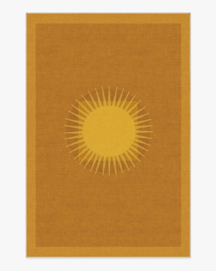 Junior Magazine Helios Gold Flatwoven Rug, £429, Matthew Williamson Collection at Ruggable